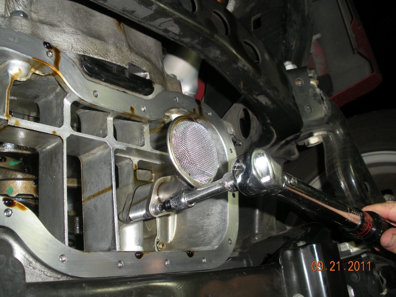 Pic_9_-_Oil_pan_spacer_boltdown_655081eb4a2de06ef7ec5c70bc8d984d0d0a4d02.jpg