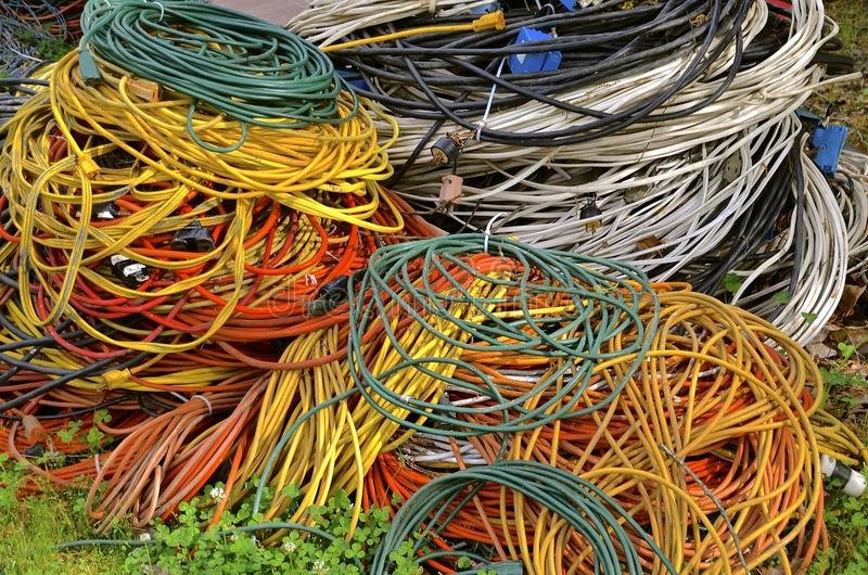 pile-wrapped-electrical-cords-various-colored-extension-piled-stack-outside-grass-90612088.jpg