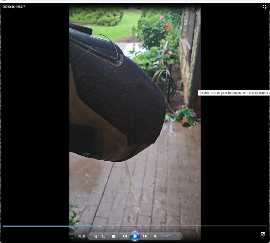 Pouring water out of the boot.jpg
