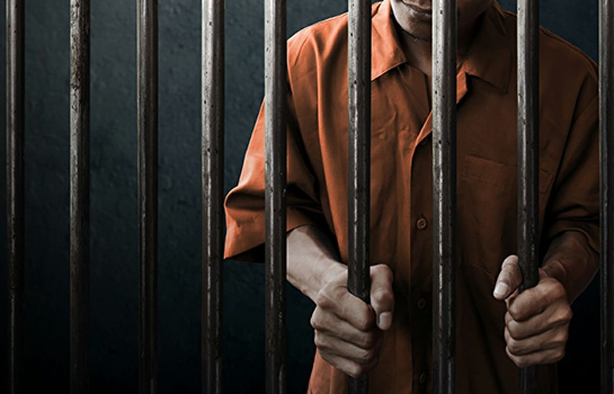 Prisoner+behind+bars_0b50b358-f914-4f43-9b1f-604611ae8bd2-prv.jpg