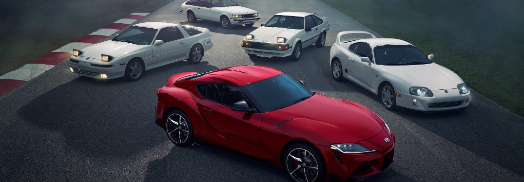 red-2020-Toyota-Supra-parked-in-front-of-older-Supra-models-in-gray_o.jpg