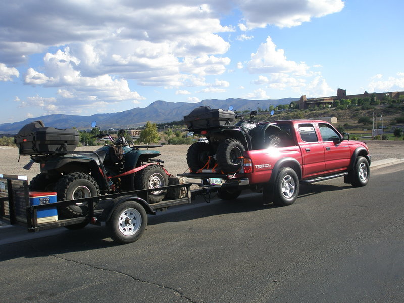 Red Toyota with older quads.jpg