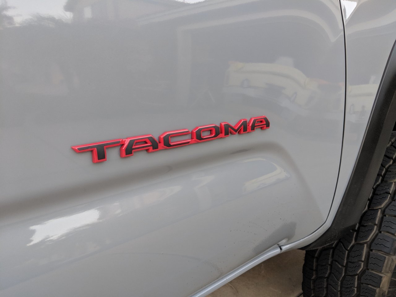 Custom door emblems - black on red | Tacoma World