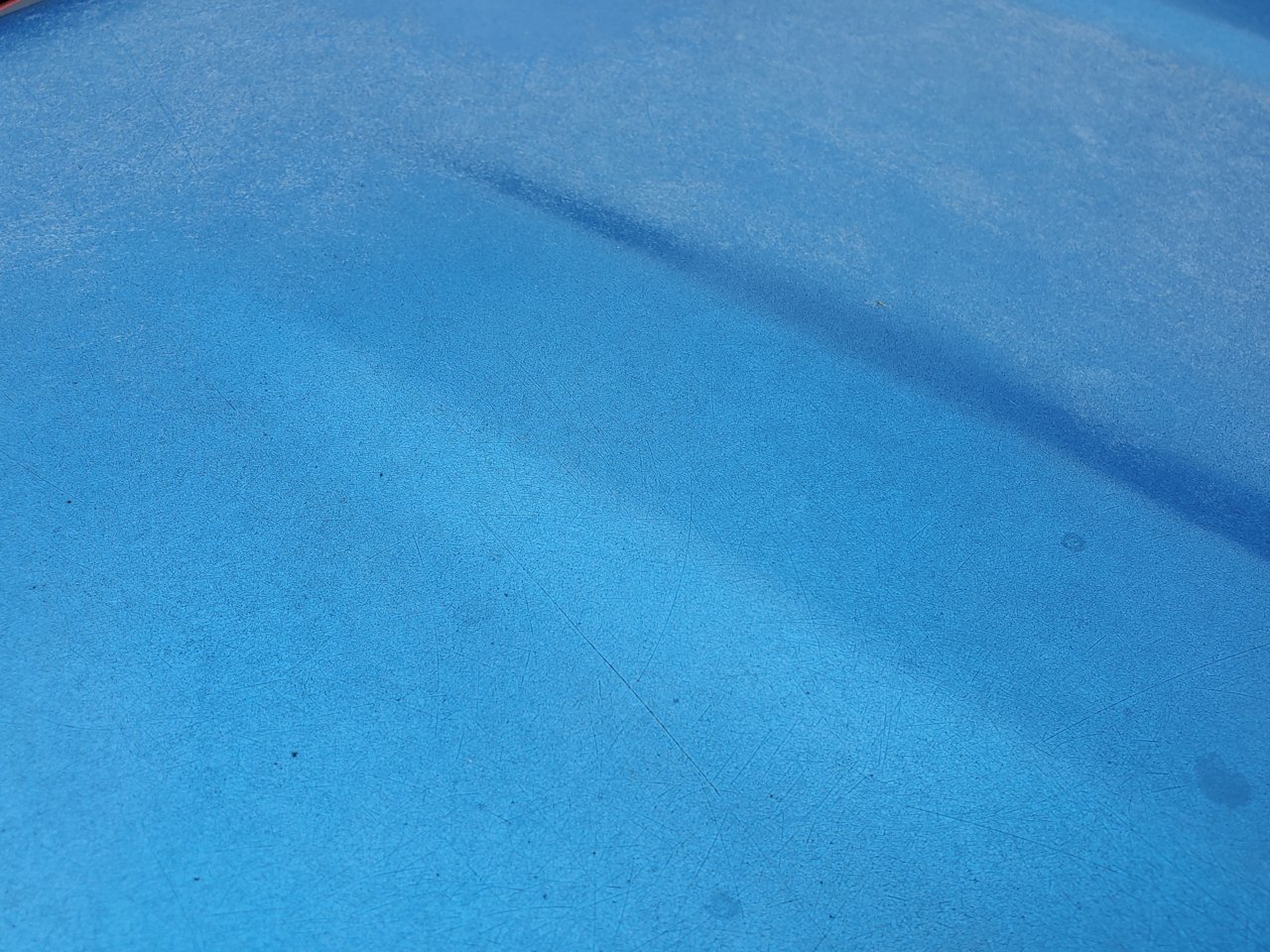 roof with damaged clear coat.jpg