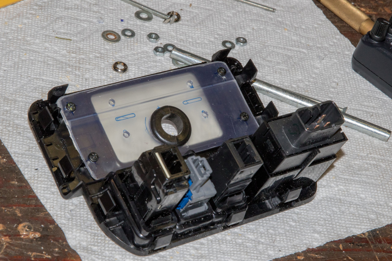 Screw plastic to switch panel.jpg