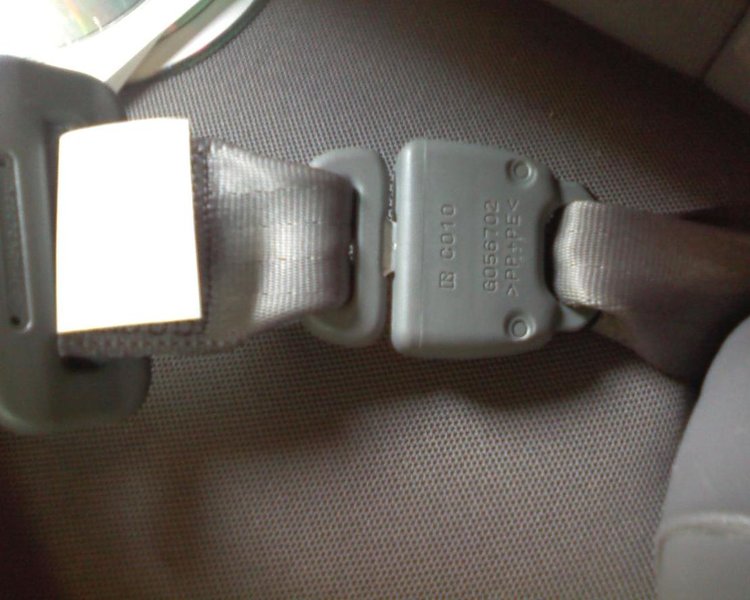Anyone know how to release the rear middle seat belt? : r/Camry
