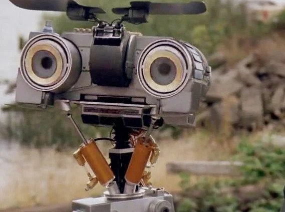 Short-Circuit-1986-film-images-12f1aa6a-44b8-428e-940a-4c51650bb0d-e1621323671248.jpg