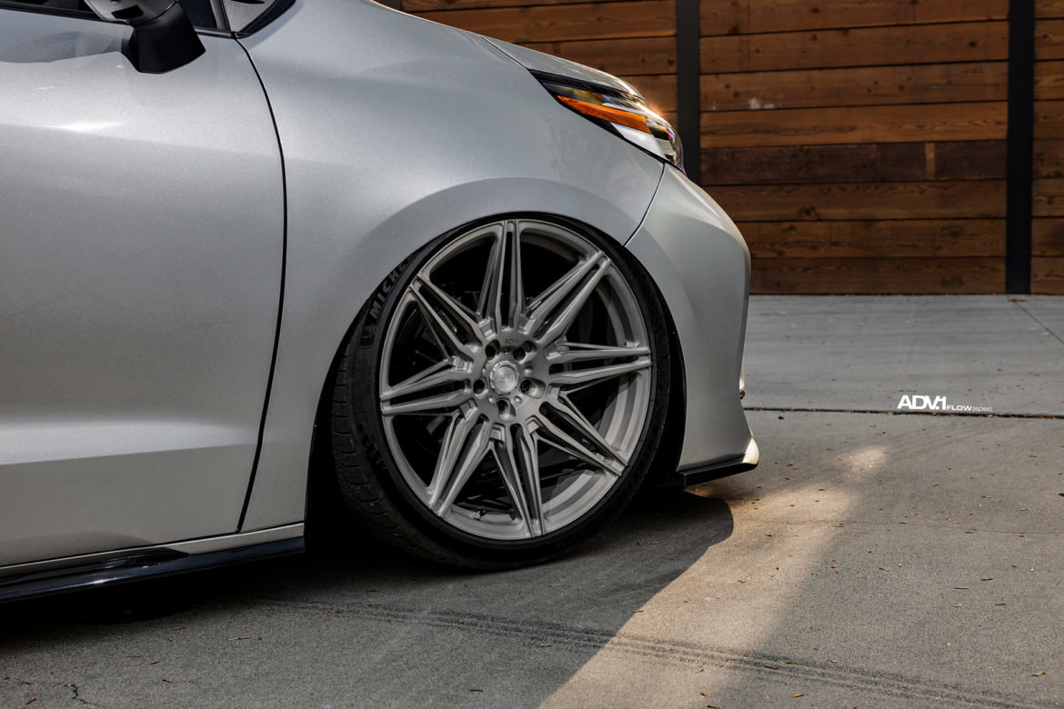 silver-toyota-sienna-bagged-mini-van-custom-adv1-wheels-thule-roof-box-d-1170x780.jpg