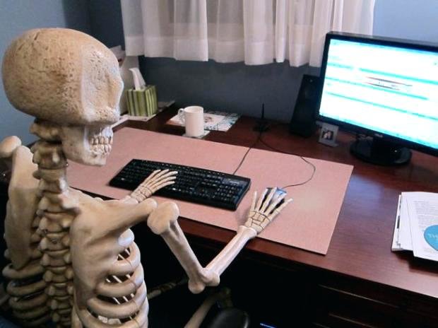 skeleton-at-desk-high-quality-skeleton-at-desk-blank-meme-template-skeleton-computer-background.jpg