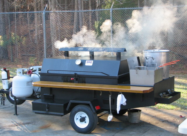 Small Pig Cooker Smoking.jpg