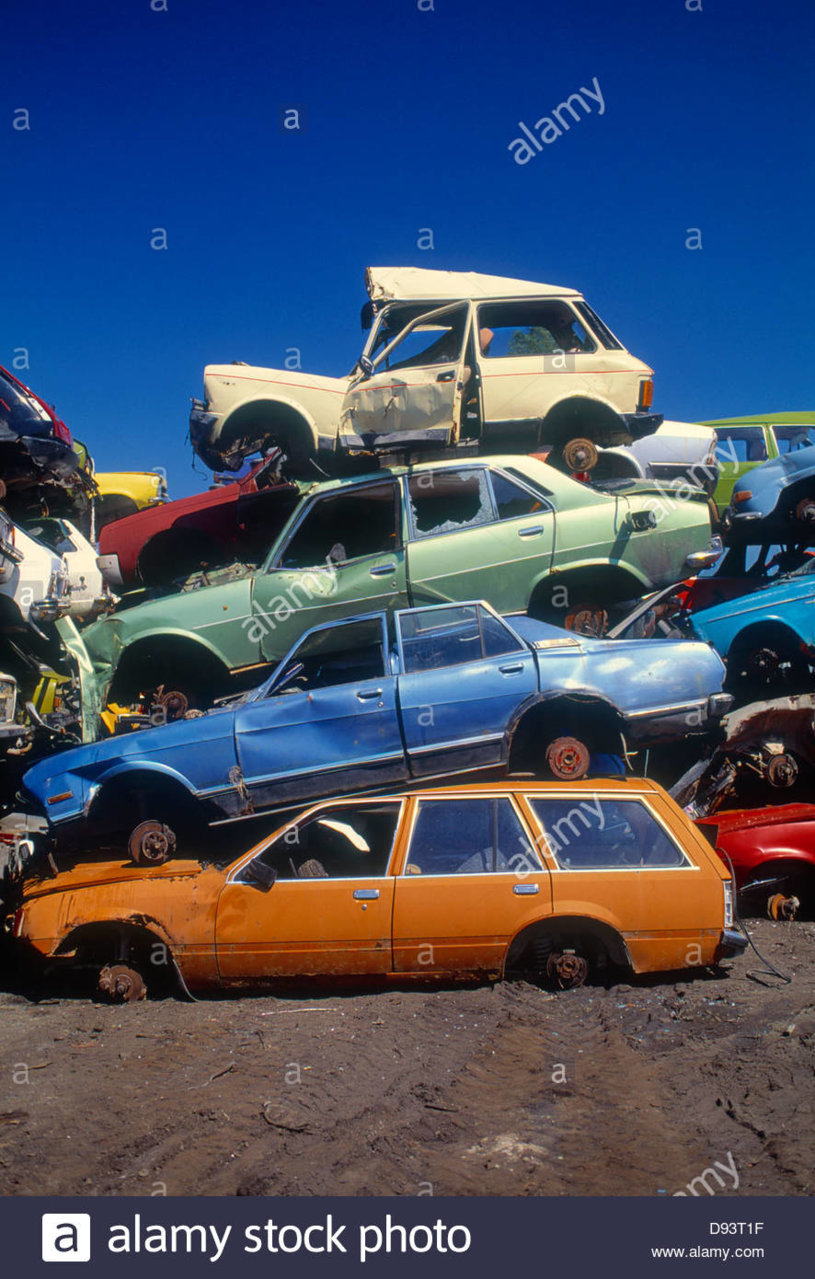 stack-of-wrecked-cars-in-junkyard-D93T1F.jpg