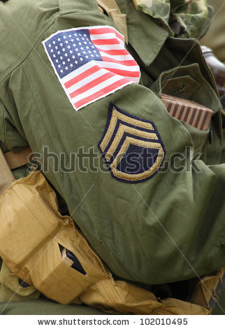 stock-photo-flag-patch-on-american-soldier-staff-sergeant-uniform-102010495.jpg