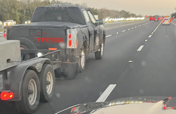 Taco 2023-toyota-tacoma-towing-trailer-rear.jpg