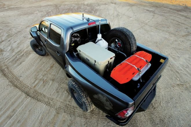 tacoma-bed-packed-with-spare-tire-and-cooler.jpg
