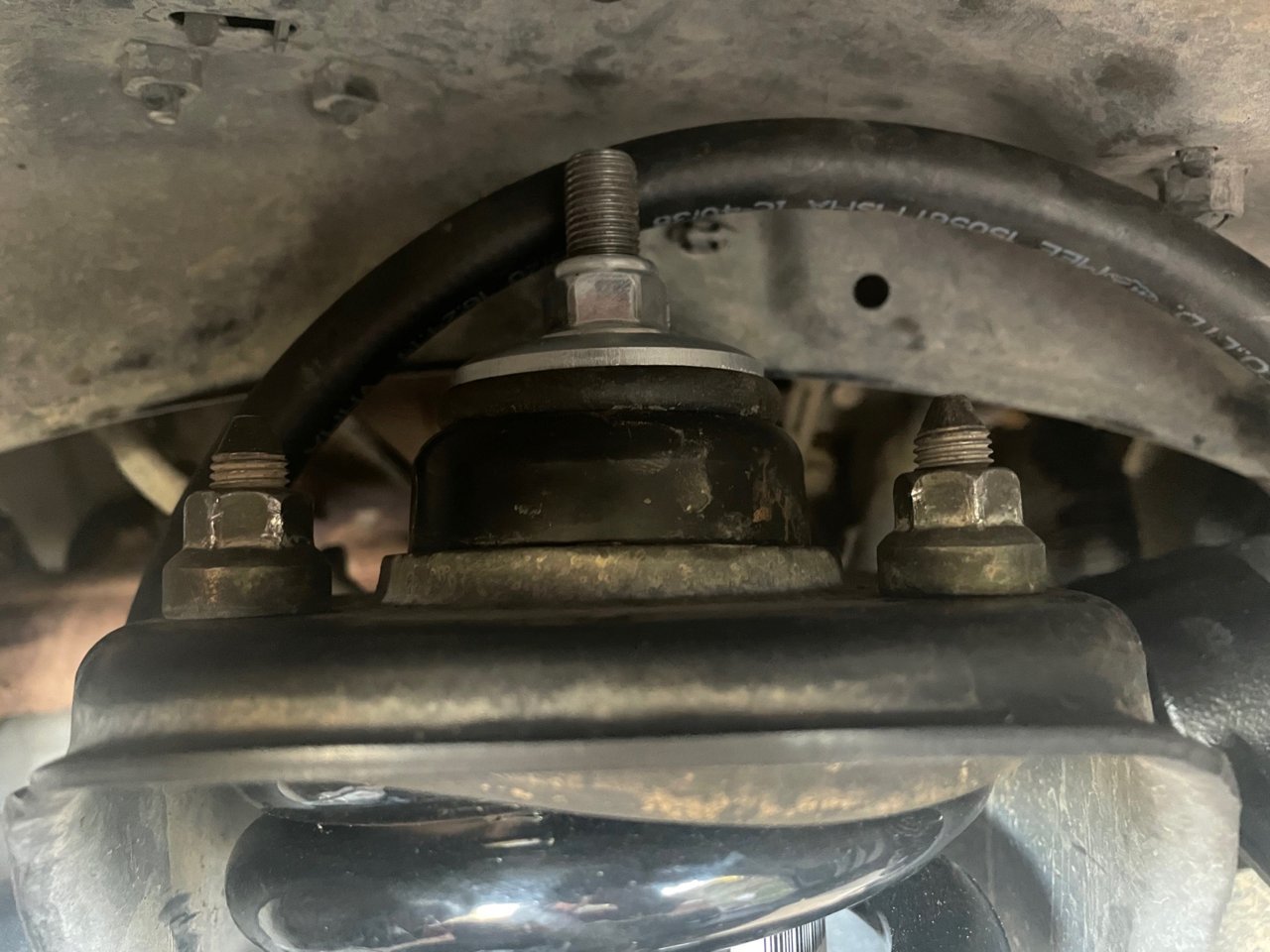 tacoma passenger side shock top mount.jpg