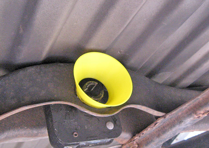 Tacoma spare tire hoist with funnel.jpg