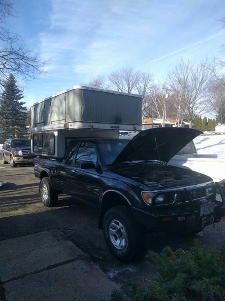 Tacoma with four wheel eagle camper.jpg