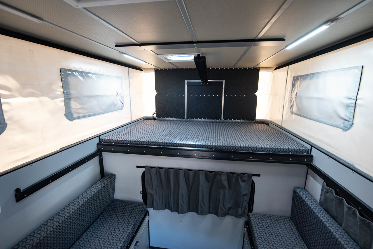 Tacoma_23_Camper_Closed_lights_front-1.jpg