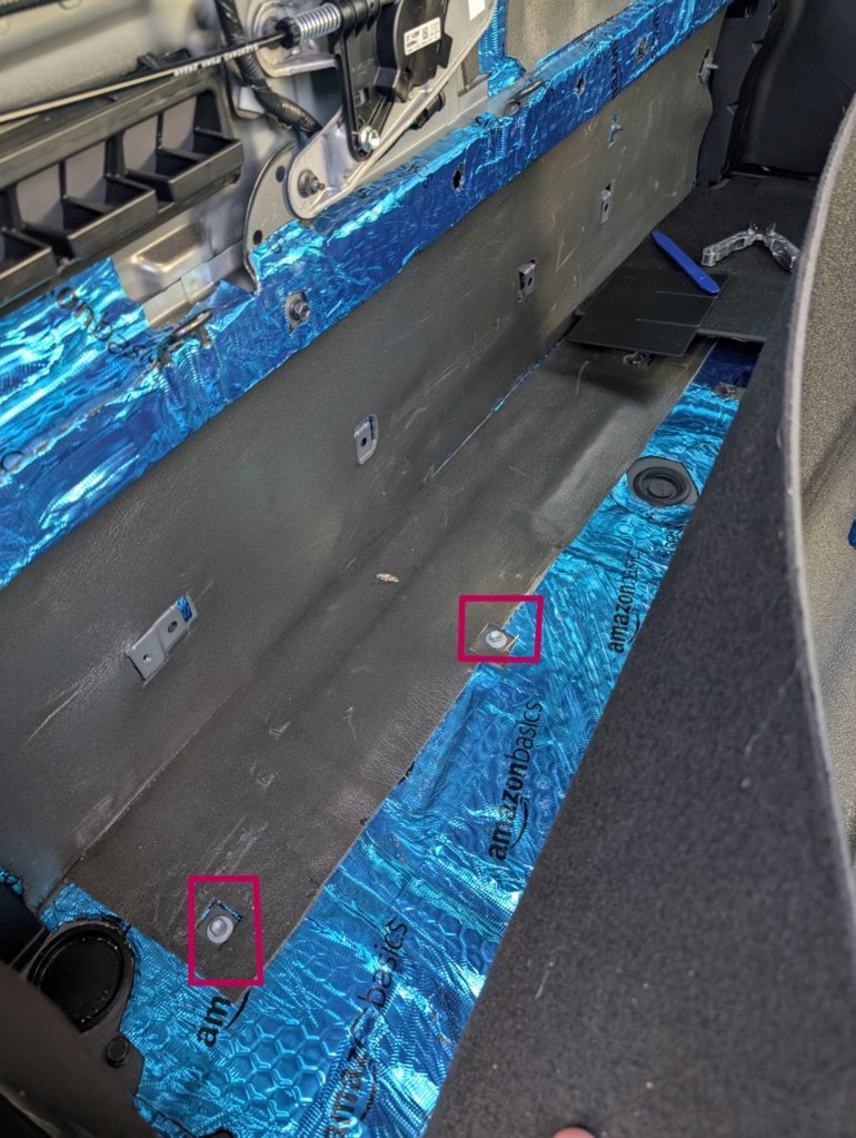 tacoma_floor_rear_bolts_covered.jpg