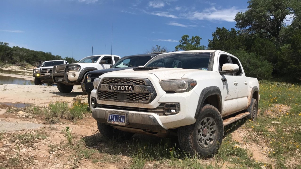 Tacomawordl group picture on riverbed.jpg