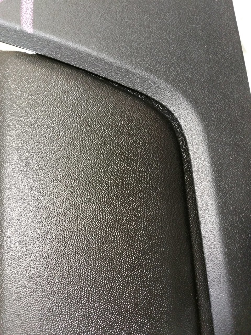 textured black comparison close-up.jpg