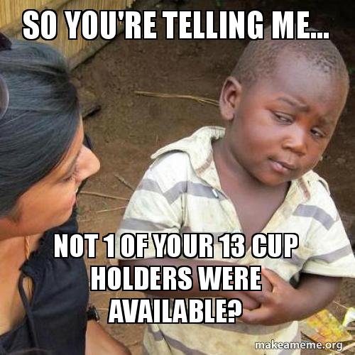 Third World Kid Telling me Cup Holders.jpg