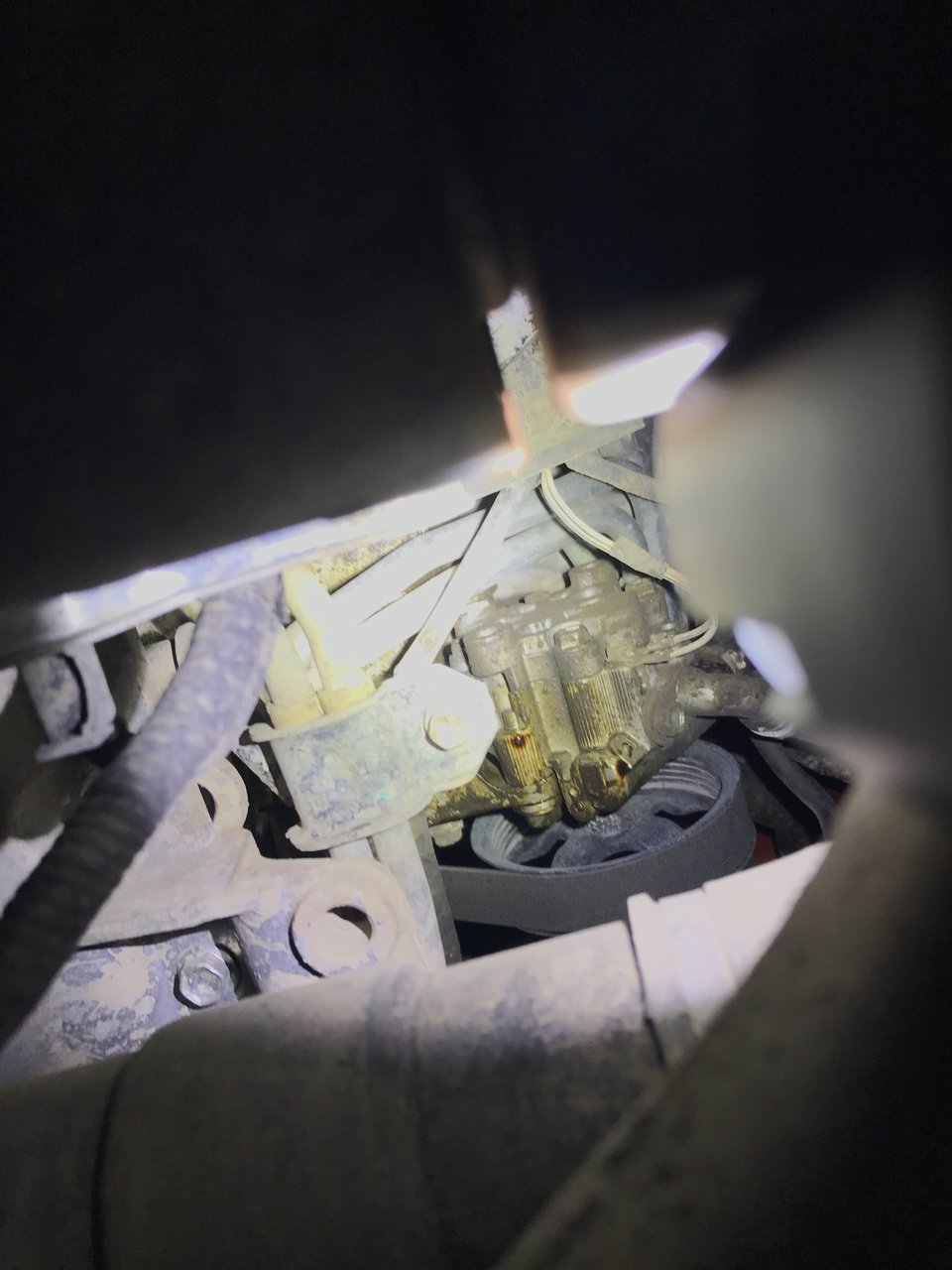 Timing Cover - Oil Accumulating on Power Steering Pump.jpg