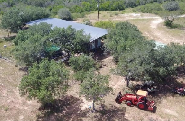 Trailer trash house and 40x80 carport pic 2..jpg