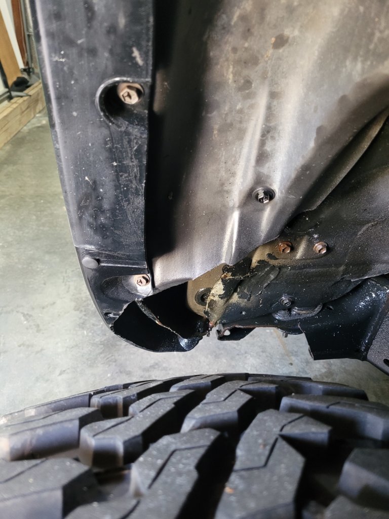 Trimming behind front wheels.jpg