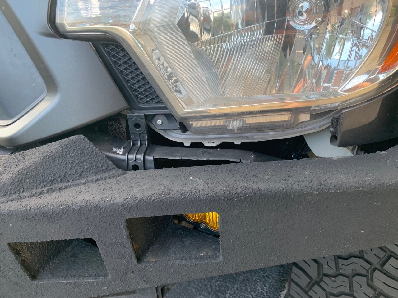 Under Headlight Trim Piece.jpg