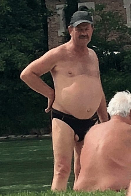 wearing-a-speedo-with-a-testicle-hanging-out-at-a-33491541.jpg