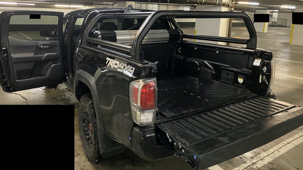 X4Tonneau rolled up Putco Venture TEC Rack.jpg