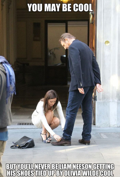 you-may-be-cool-liam-neeson-getting-his-shoes-tied-by-olivia-wilde.jpg