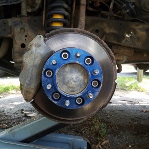 FYI.... FJ Anthracites clear Tundra brakes just fine...