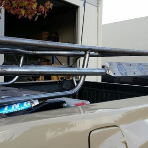 Custom Bay Area Metal Fab bed rack. Mid height. Mounts to shock cage.