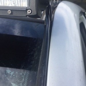 Wasn't about to take a drill to my cab so I ran the wiring against the windshield molding using 3M adhesive