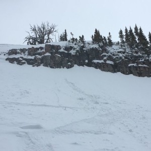 On marks daily dose of skiing: I hiked 50 minutes and 1600 vertical feet to hit this 20' cliff line and ride some crusty powder at the bottom. Spot th