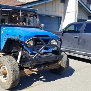 Needs all steering. Rear links (setup for 4 link) has 5.18 geared dana 60s. Motor, trans and transfer all working. Came with two sets of doors, both s