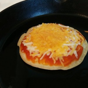 Pizza pancake cuz my 3 year old wants pizza and i have flour, sauce and cheese