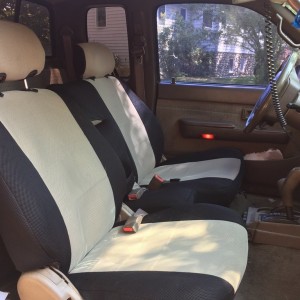 New seat covers, it's incredible how clean the inside looks now with those dirty ripped seats covered up!