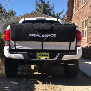 Rear shot of tires and tailgate pad