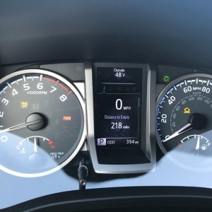 Less than 400 miles and a check engine light. Also, whenever Im below a certain speed or going around a corner traction control turns off. Anyone see
