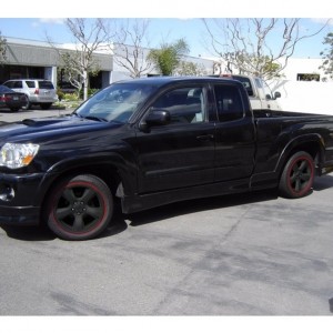 dirty truck with black wheels