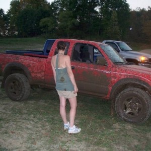 Muddy truck and wife