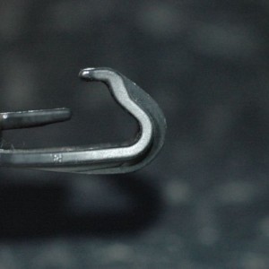 The bottom clip for the mirror mounting