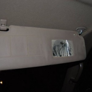 tan passenger side 2000 model visor - broken