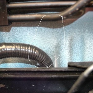fuel lines meet wiring harness under the truck