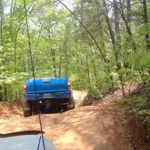 eddie going thru a trail......blue balls in tow!!!