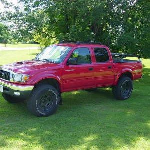 3/4 SHOT after lift, tires, hood and flares