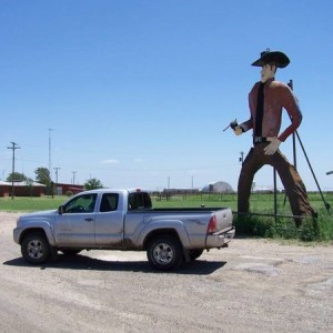 Adelaide being checked out by a giant cowboy in Texas.